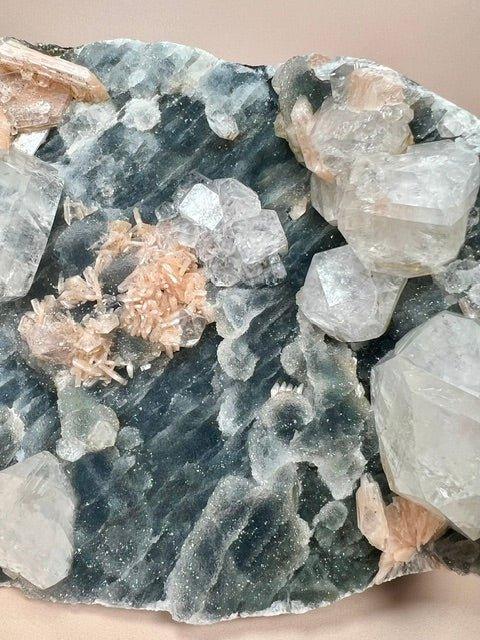 Blue chalcedony slab with apophyllite and stilbite mineral crystals display
